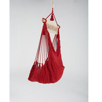 Hanging outdoor and indoor red rope hammock chair
