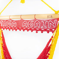 MAGA AGAIN red hanging chair with sign