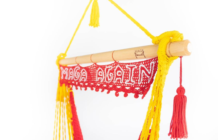 MAGA AGAIN red and gold swing chair with sign