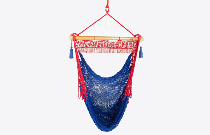 Outdoor and indoor hanging chair hammock.  Blue hammock chair with Deplorable sign.  
